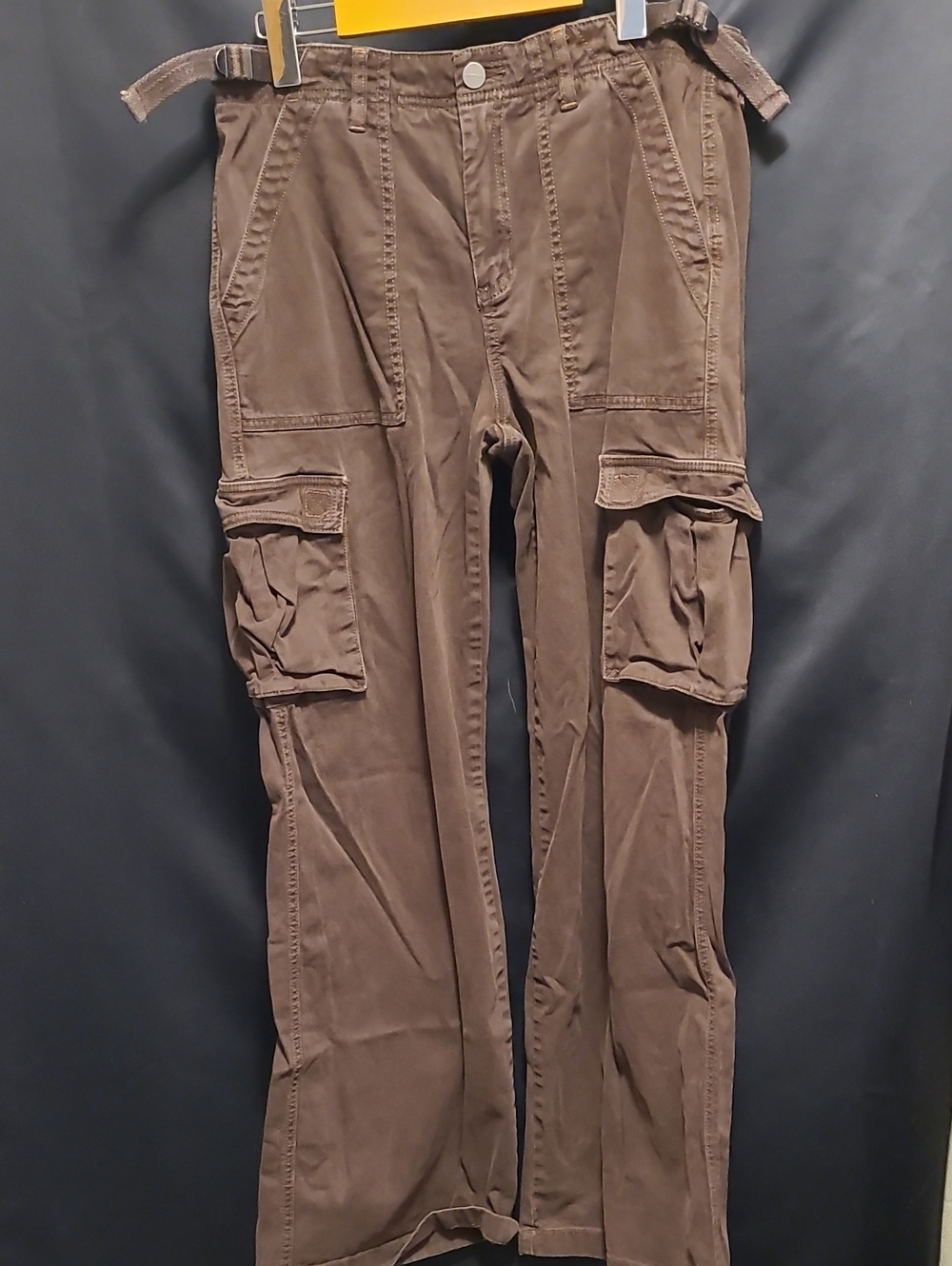SANCTUARY relaxed cargo pants, featuring side buckle adjustments at the waist.